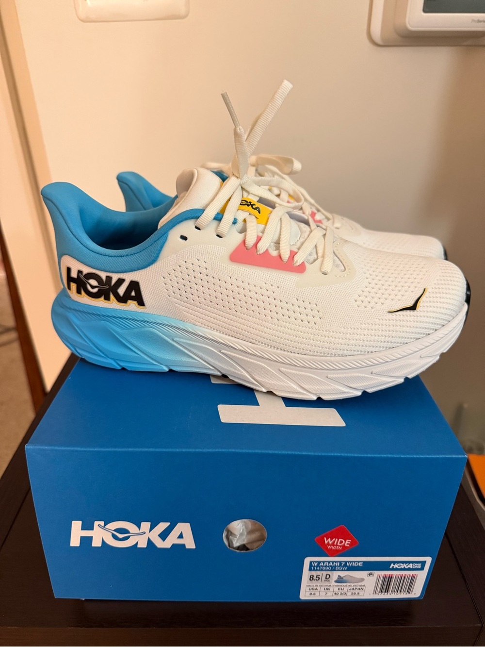Hoka White Athletic Sneakers with Blue, Pink & Yellow Accents